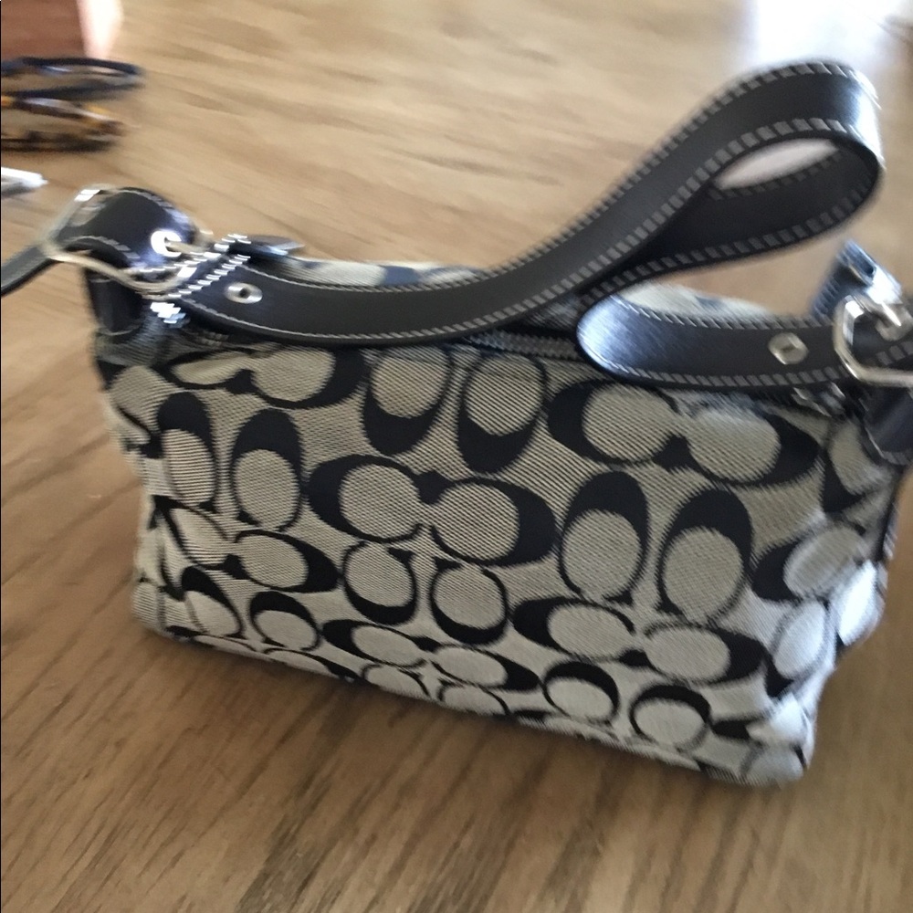 Coach pre-owned like New Wristlets